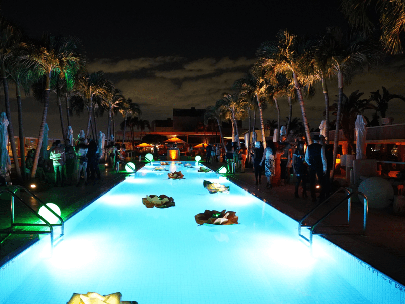 an outdoor pool at night
