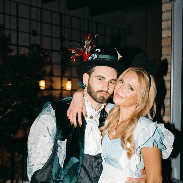 man and woman in halloween costumes