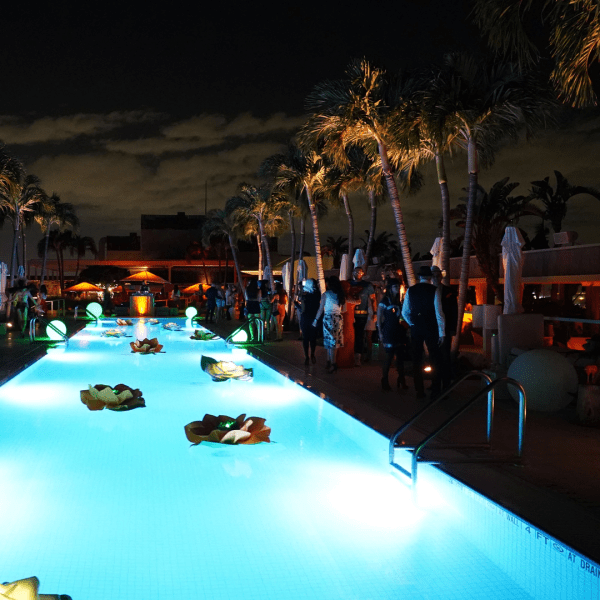 an outdoor pool at night
